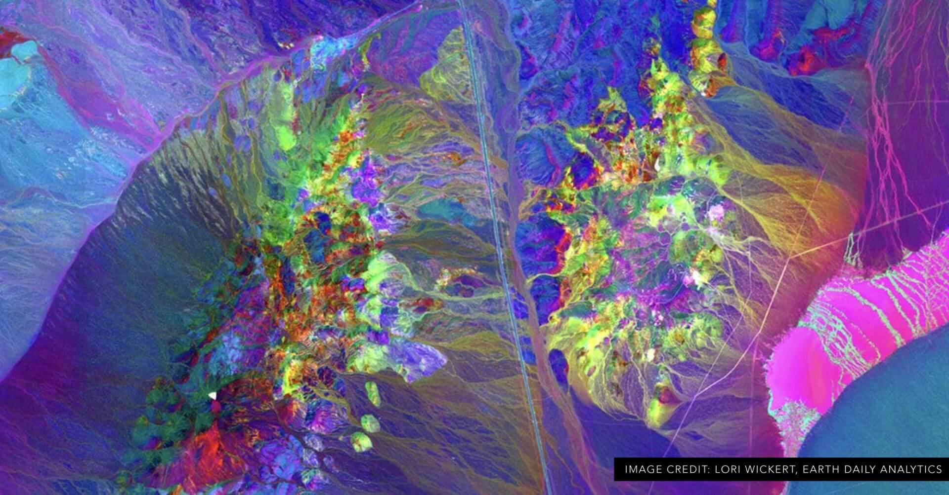 Colorful satellite image of geological formations.